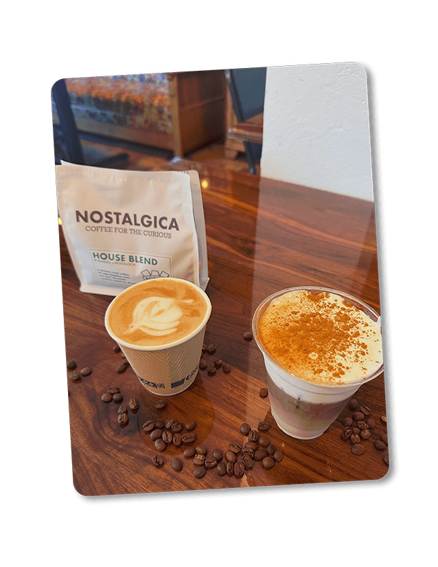 Delicious coffee drinks next to coffee beans